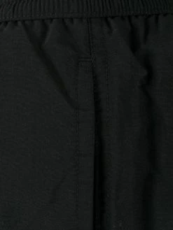 AMI Paris Short de bain à patch logo Prix Ourlé shorts de bain homme 5 AMI Paris short de bain à patch logo