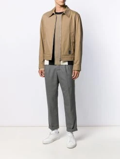 AMI Paris pantalon fuselé à design plissé