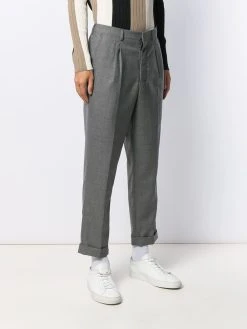 AMI Paris pantalon fuselé à design plissé