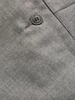 AMI Paris pantalon fuselé à design plissé