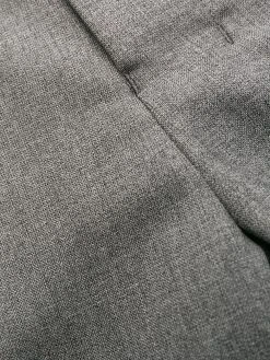 AMI Paris pantalon fuselé à design plissé